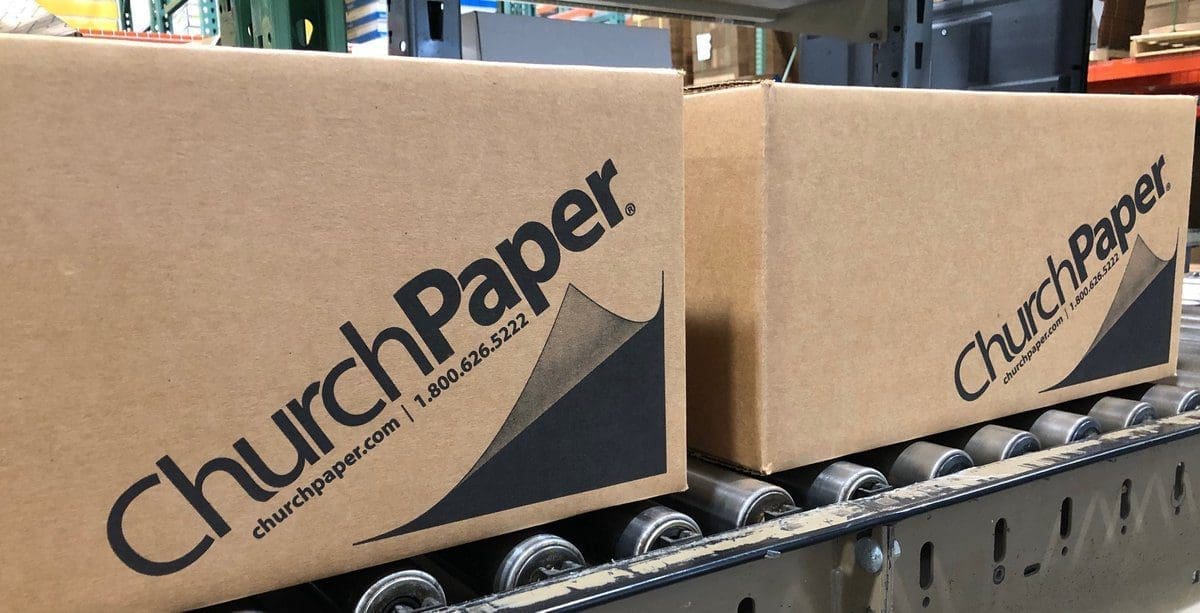 Box of imprinted products including custom printed envelopes - Wholesale printing paper distributor