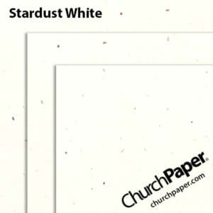 Neenah Astrobrights® Stardust White paper swatch showing overlapping off-white sheets with small multicolored flecks.