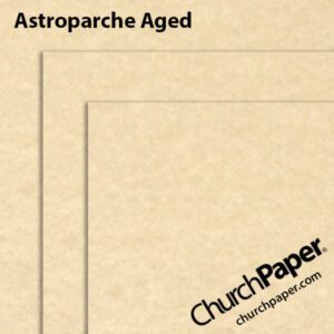Neenah Astroparche® Aged paper and cardstock swatch showing warm antique beige sheets with subtle mottling, parchment-style texture and layered sheet corners from Church Paper.